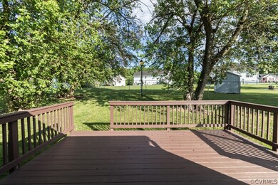 Wooden terrace with a yard