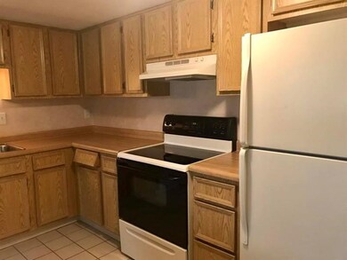 Kitchen includes refrigerator, dishwasher, oven an
