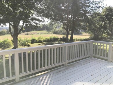 View from deck of rolling sloping...