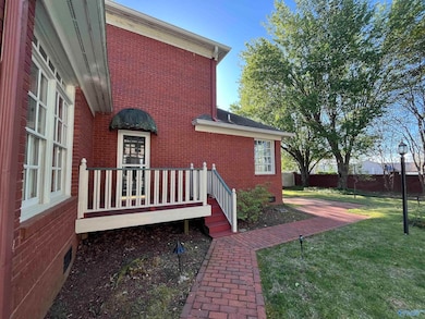 entrance from primary bedroom to deck and pool access