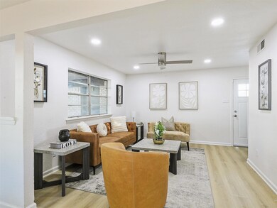 Living room featuring light hardwood / wood-style 