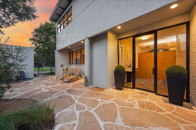 Front door to house facing east. Lower windows to