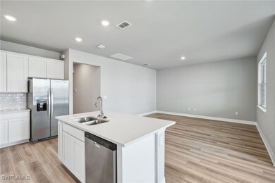 Photos are of a model home with the same floorplan