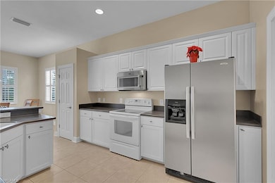 5569 Whispering Willow Way, Fort Myers, FL 33908 - photo 6