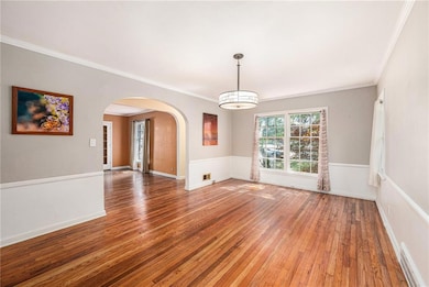 Formal dining room with wainscoting