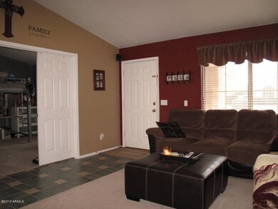 LIVING ROOM WITH VIEW INTO DEN