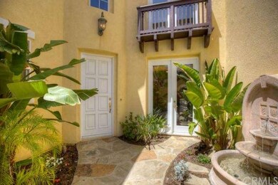 An Elegant Stone Gated Entry with Fountain
