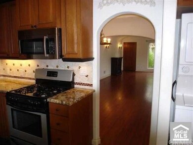 View from kitchen through dining room into living 