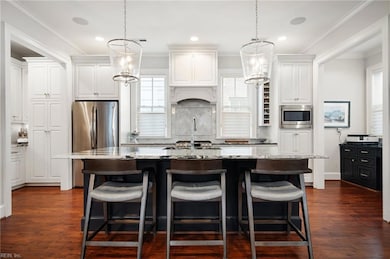 Chef's kitchen open to main living space