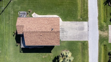 Overhead shot which shows the large lot, ample par