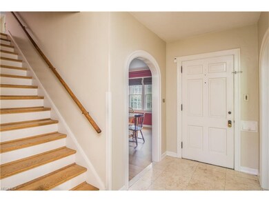 Marble floors located in foyer.