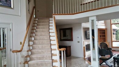 Stunning staircase leads to three huge bedrooms on