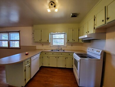 Lots of cabinet and counter space!  Range and dishwasher stay with the home.