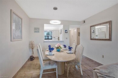 Dining area with l tile flooring