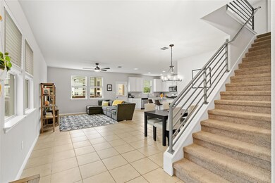 Living area featuring light tile patterned floori