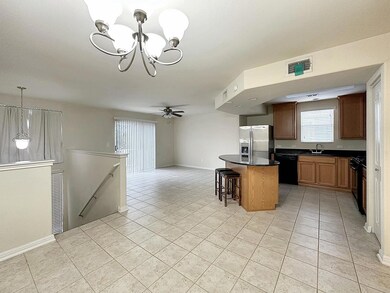Kitchen featuring light tile patterned flooring, 