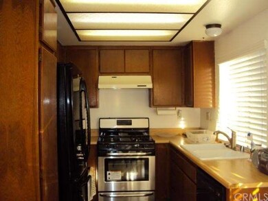 KITCHEN WITH NEW GAS RANGE, DISHWASHER AND REFRIGE