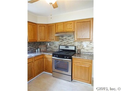 Kitchen. The stainless gas stove and attractive up