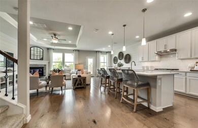 Open concept living areas *Photos of furnished mod