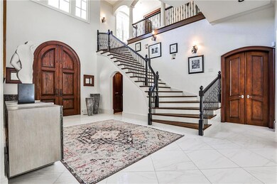 Entrance foyer. Double doors on the right lead to the master suite.