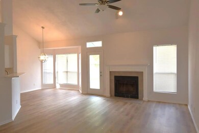 Unfurnished living room with vaulted ceiling, cei