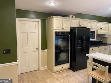 920 Sugar Creek Dr SE, Conyers, GA 30094 - photo 5