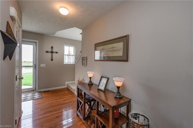 Spacious Foyer entry with hardwood floor