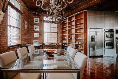 dining table, wall of built in shelving