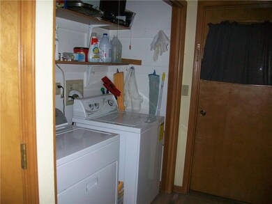Laundry next to kitchen door to mudroom