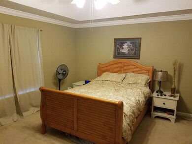 Large Master Bedroom offers beautiful trey ceiling.