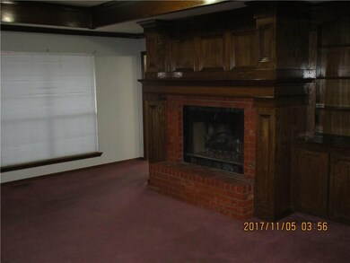 Awesome fireplace with built-in bookcases