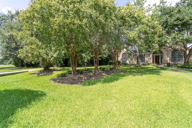 This home is at the end of the cul-de-sac. Note the large grove of shade trees adjacent to the home. The trail is on the left. You are close to both pools. There are community tennis courts and a workout room also.