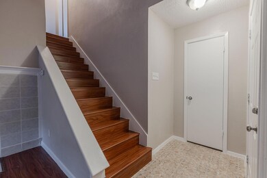 Entrance to property with a patio