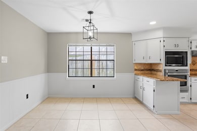 Bright and inviting dining space featuring a large