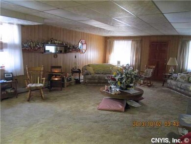 Living Room. 225 West Fifth St.