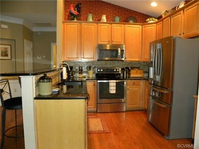 Another view of vaulted kitchen