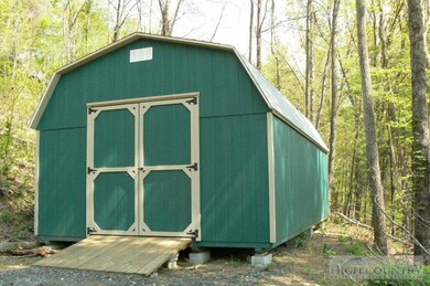 outbuilding at lower level of property.