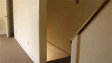 From Living Room, Stairs lead down...