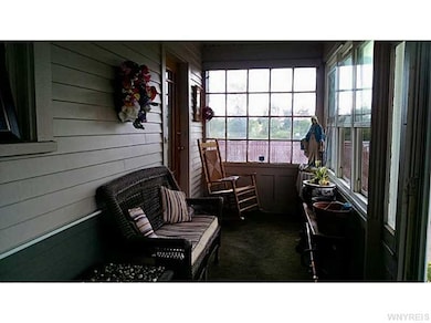 Foyer. Enclosed front porch