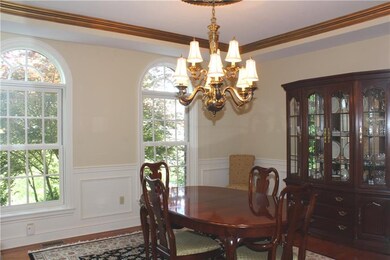 Dining room with two oversized window feature pall