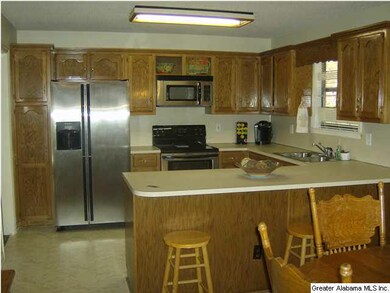 Huge kitchen with bar area
