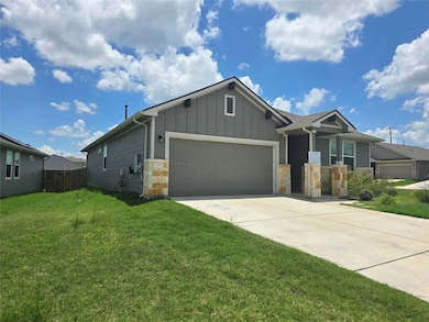 Craftsman house with an attached garage, board an