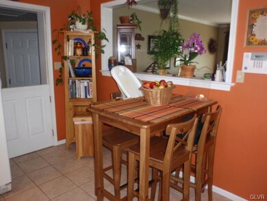 Another view of the kitchen and table area.  Note 