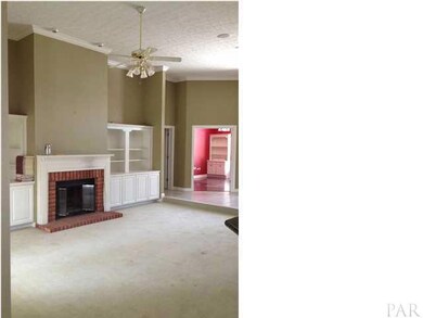 12 1/2' ceilings, built-ins flank the fireplace