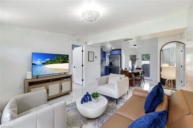 Living room with light marble finish flooring