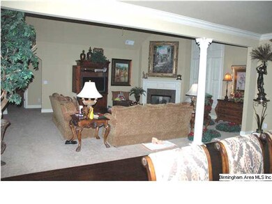 View from formal dining area to living room, great