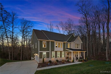 View of front of property with a lawn, a porch, an