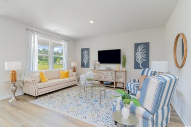 Living area featuring wood finished floors and baseboards