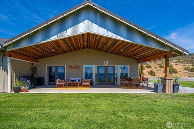 A must see home on 20 acres with lake and mountain views unsurpassed