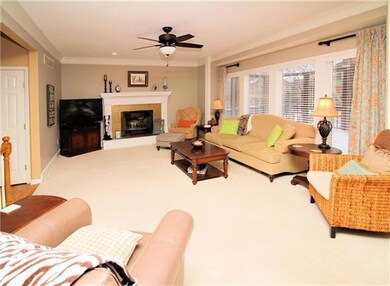 Great room with floor to ceiling windows with new 